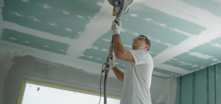 Man Polishing the Ceiling