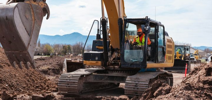 a bulldozer in a dirt field